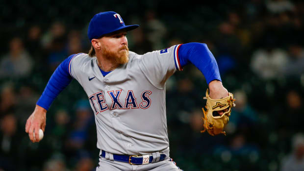 Apr 19, 2022; Seattle, Washington, USA; Texas Rangers starting pitcher Jon Gray (22) throws against the Seattle Mariners during the fourth inning at T-Mobile Park. Mandatory Credit: Joe Nicholson-USA TODAY Sports